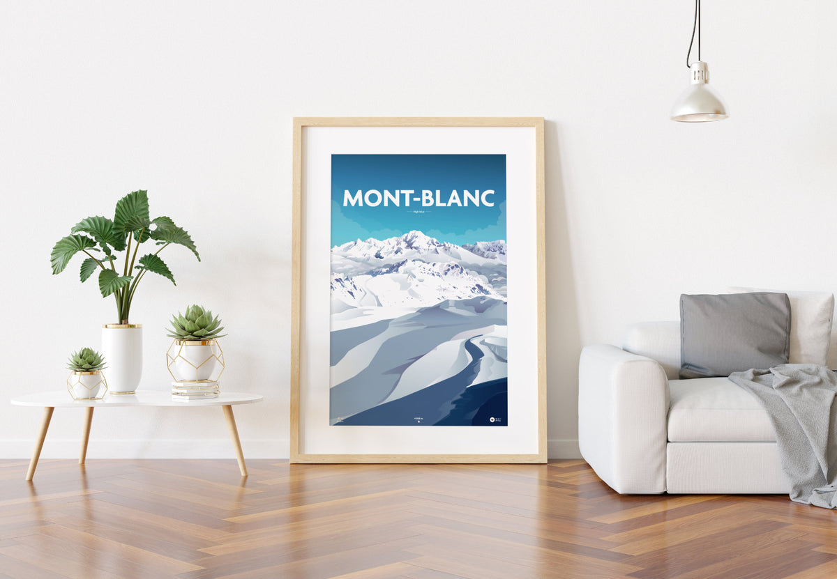 grande affiche illustrée du mont blanc encadrée et posée au sol dans un salon